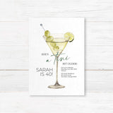 Birthday party invitation featuring a watercolor martini glass with green olives and lime, playful script and serif fonts, and text that reads “She’s a tini bit older,” ideal for cocktail-themed birthday parties.