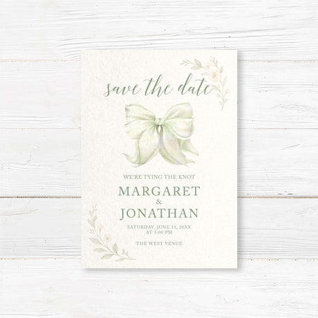 Save the date card with tying the knot bow and soft floral design