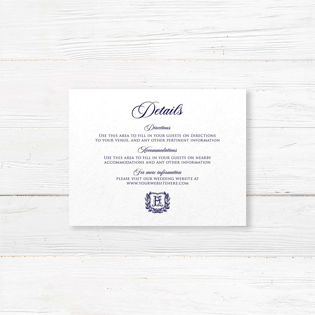 Wedding details insert card with navy text and monogram crest for classic formal wedding invitations
