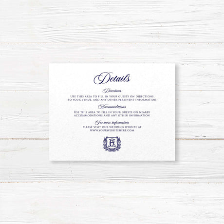 Wedding details insert card with navy text and monogram crest for classic formal wedding invitations