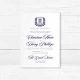 Formal wedding invitation with a vintage-style shield and laurel wreath monogram. Features elegant script for the names and classic serif text for wedding details.
