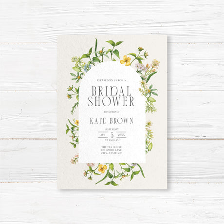 Bridal shower invitation featuring a delicate floral arch design with elegant typography. Customizable with the bride’s name and event details, perfect for garden or tea party-themed showers.