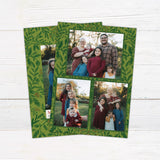 Personalized family Christmas photo card featuring winter greenery, berries, pinecones, and a large family portrait. The coordinating back includes three additional family photos surrounded by botanical holiday artwork.