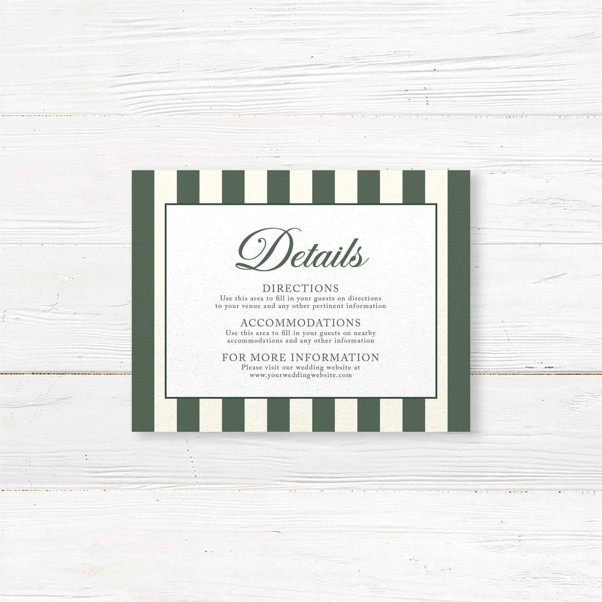 Detail card for winter wedding with elegant serif text, vertical dark green and ivory stripes, white panel layout, and floral crest matching Winter Crest stationery suite.