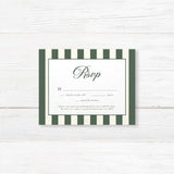 Wedding RSVP card with dark green and ivory stripes, elegant serif font, and floral crest design to match Winter Crest wedding suite for a formal seasonal celebration.
