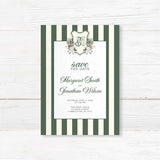 Save the Date card for winter wedding featuring dark green and ivory vertical stripes, centered white panel, floral crest monogram, and romantic script and serif fonts.